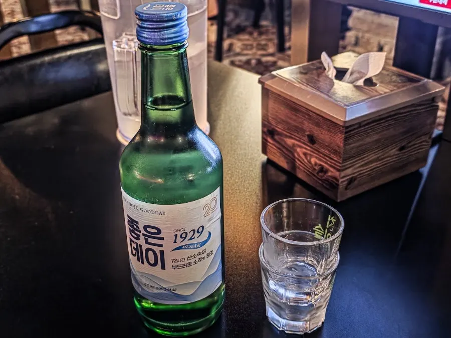 A bottle of Good Day soju ordered with a glass