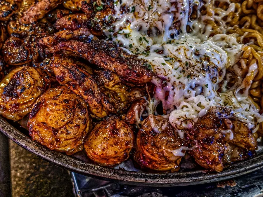 Plump grilled beef intestine coated in spicy sauce