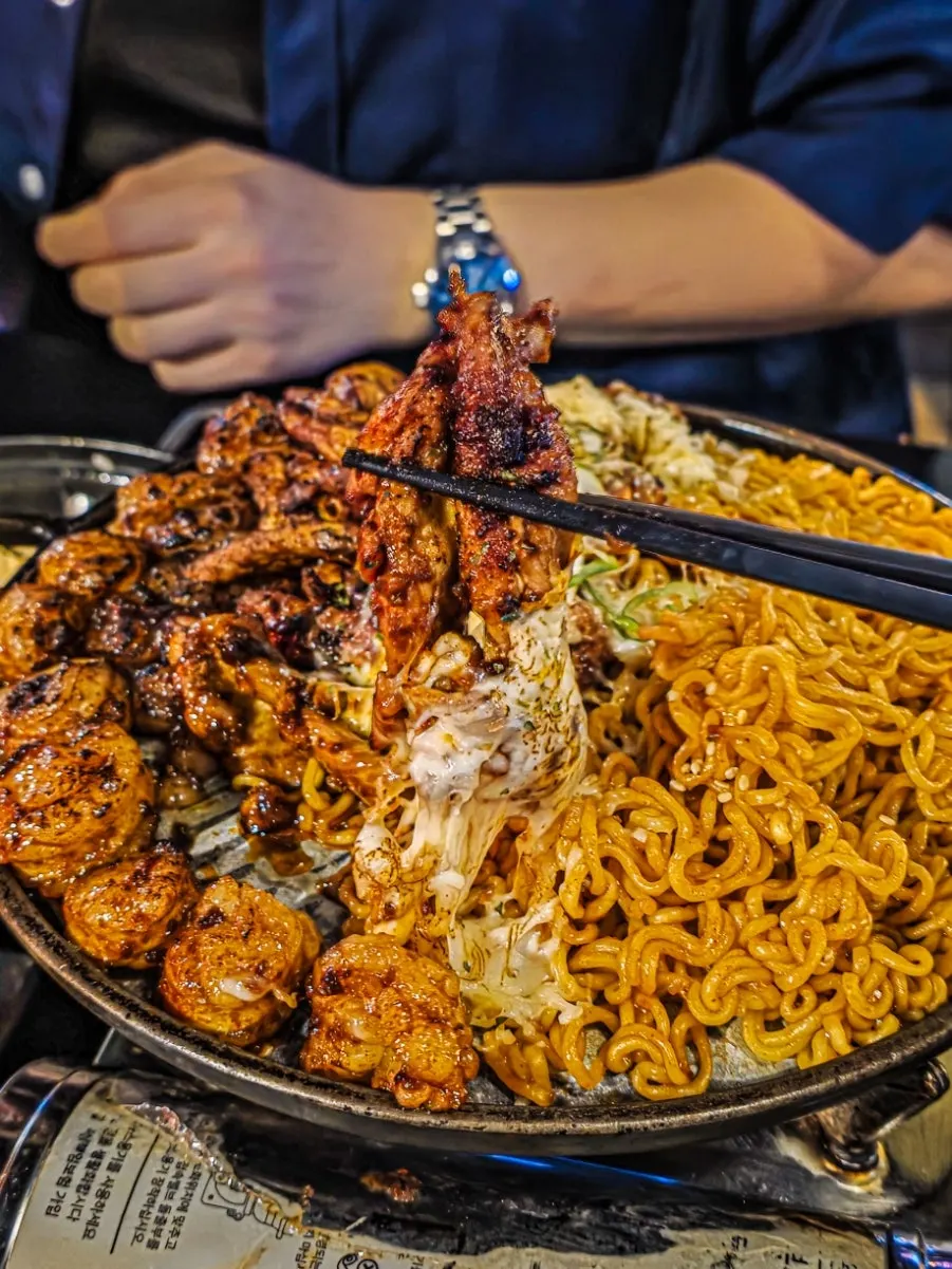 Close-up of smoky grilled chicken neck meat