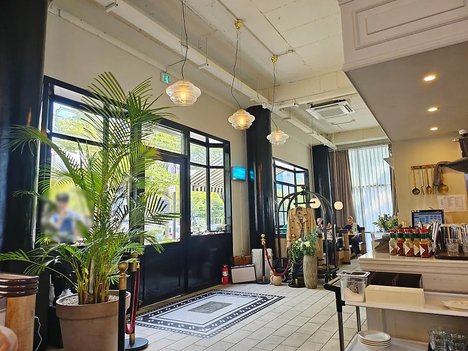Interior of Bueokgan Sangmu Branch styled like an Italian vintage hotel