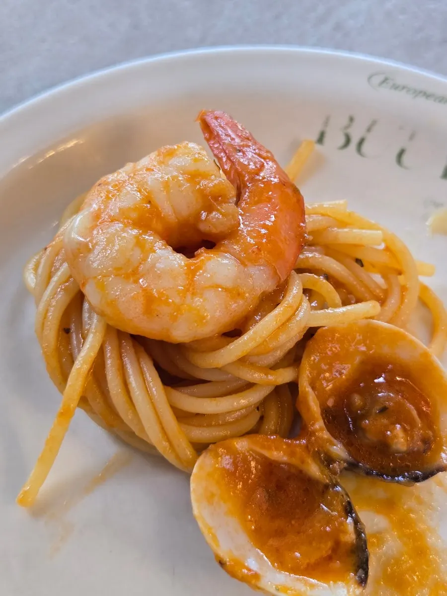 Seafood tomato pasta ordered by the writer's husband