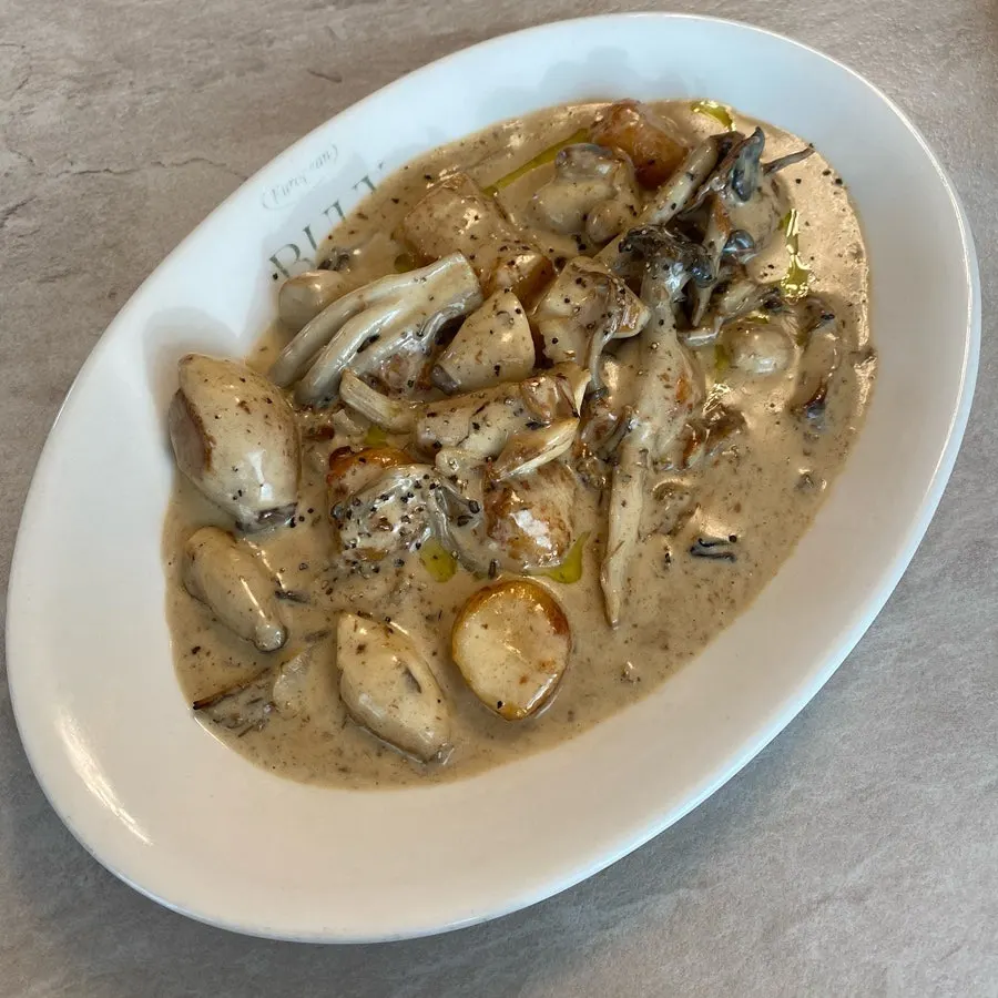 A plate of cream gnocchi at Bueokgan Sangmu Branch