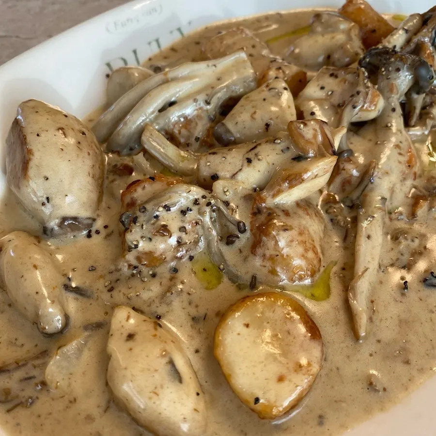 Cream gnocchi coated in sauce at Bueokgan