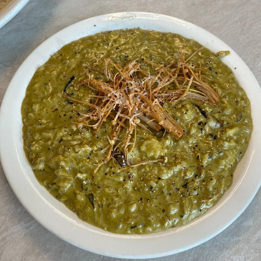 Bueokgan Sangmu Branch's abalone risotto topped with abalone