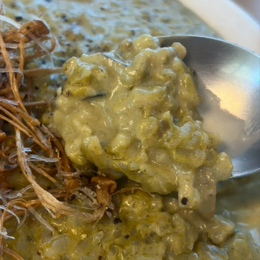 Abalone cream risotto topped with fried mushrooms