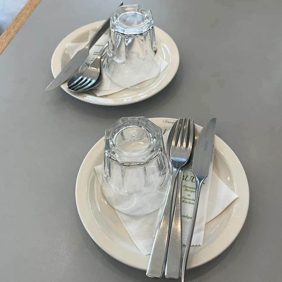 Tableware neatly arranged on the table