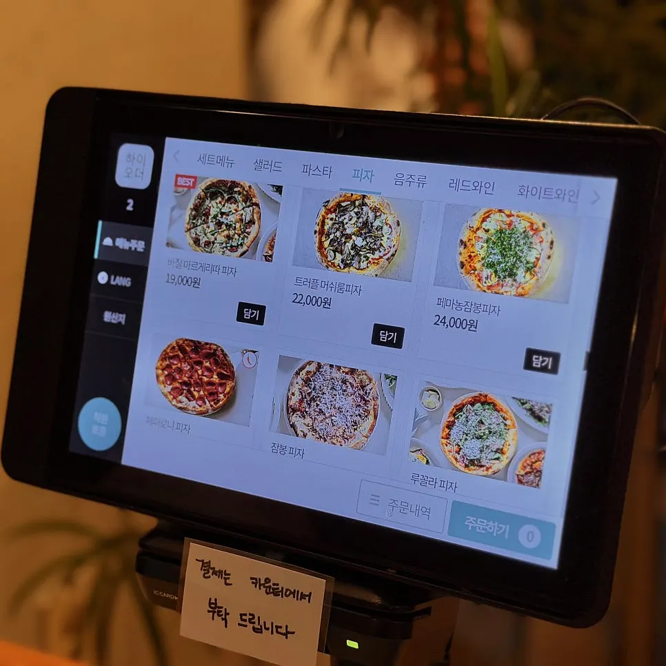 Pasta and pizza menu options at Bueokgan Suwan Branch