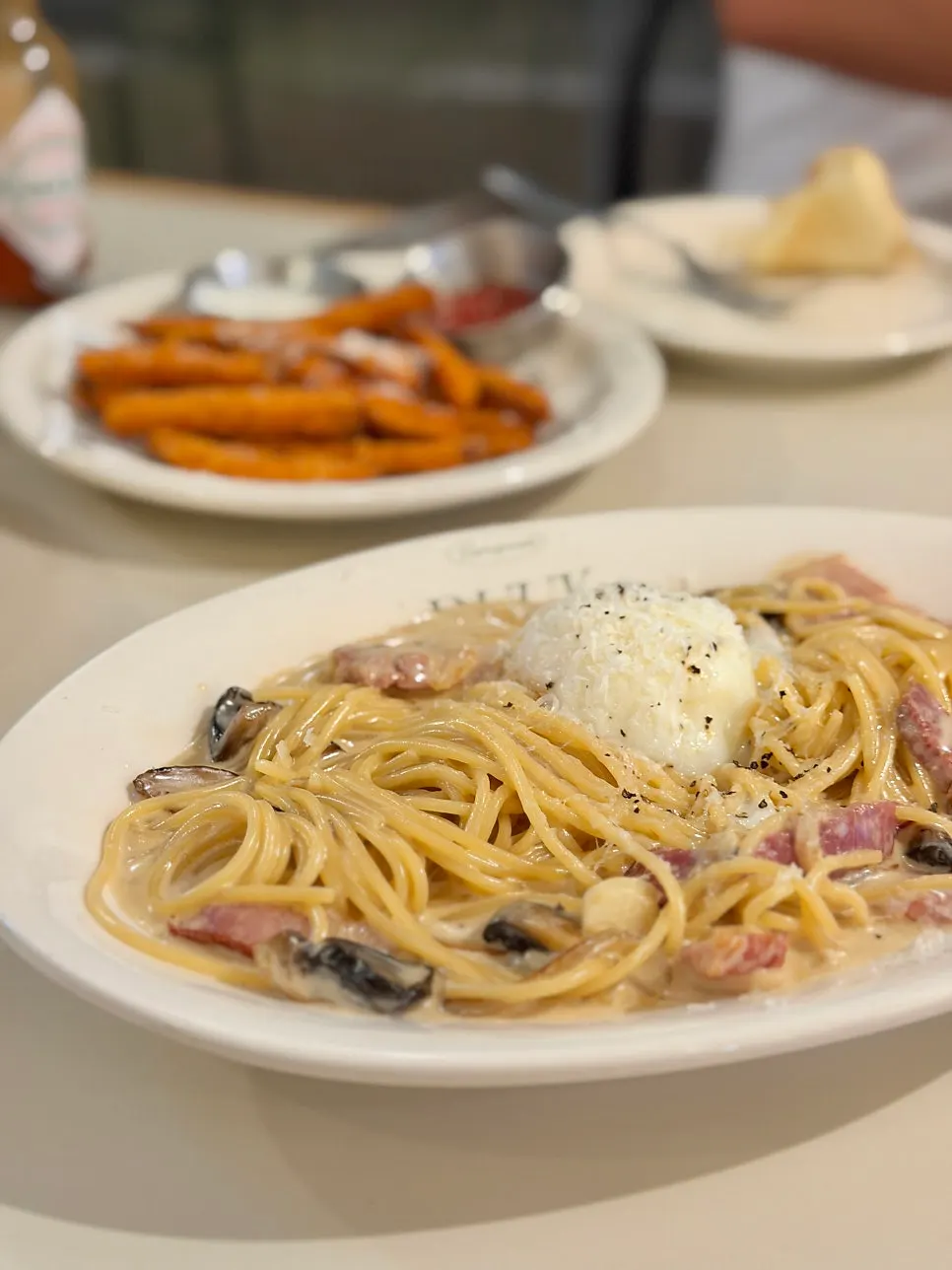 Carbonara topped with a poached egg at Bueokgan Suwan Branch