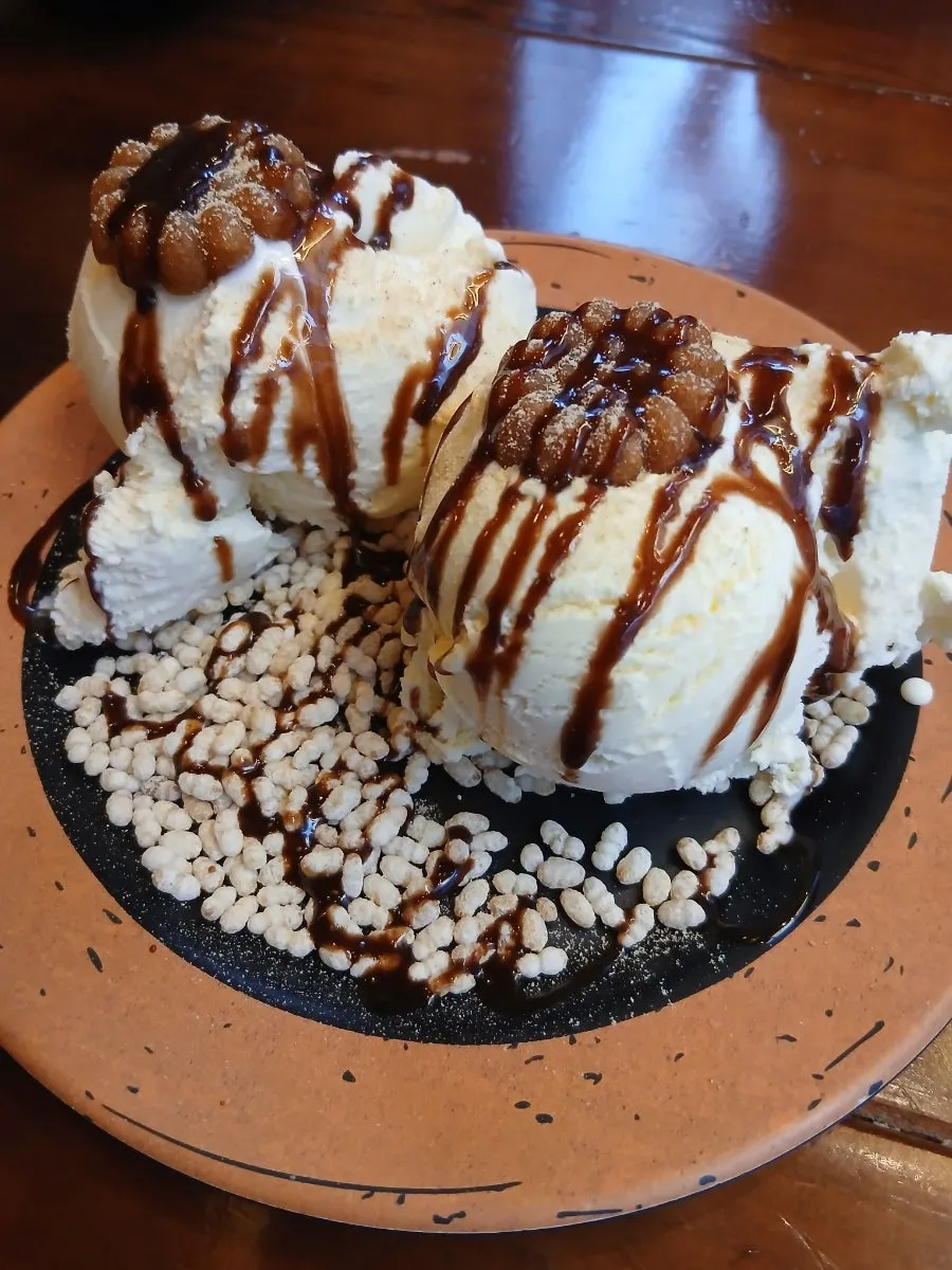 A mini yakgwa scooped up together with the ice cream