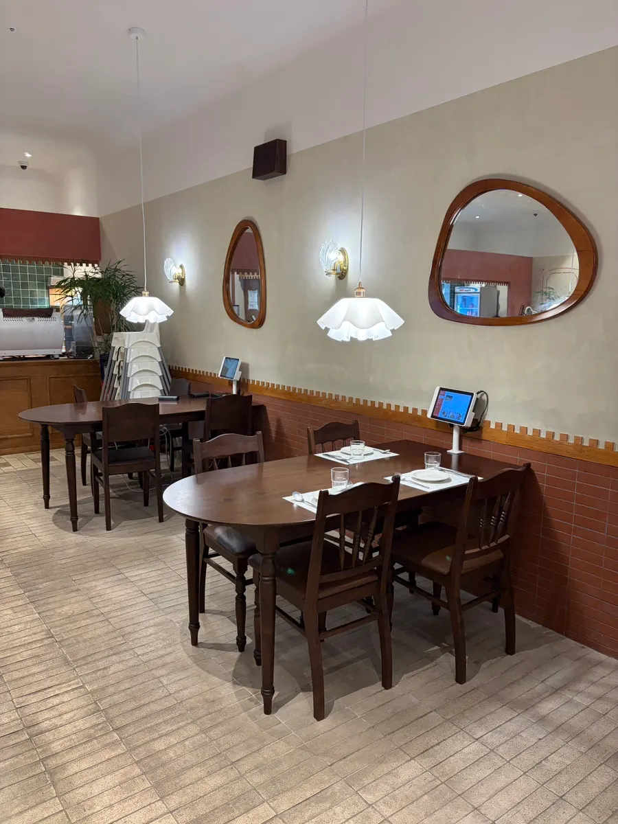 Tables and lighting at Bueokgan Restaurant