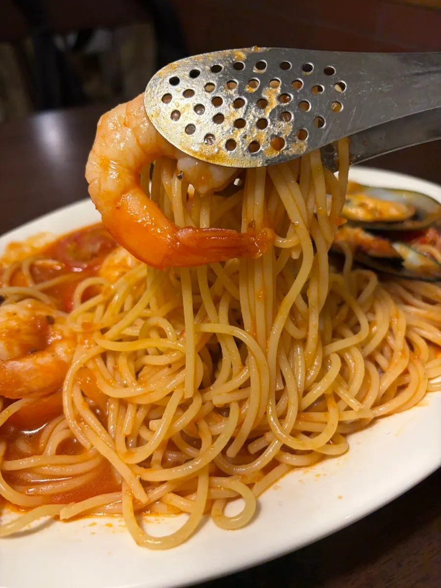 Close-up of spicy tomato sauce seafood pasta