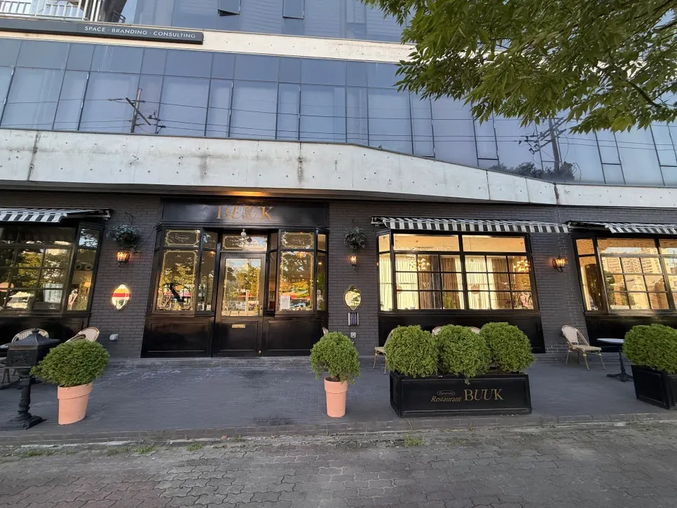 The restaurant's window-covered front facade