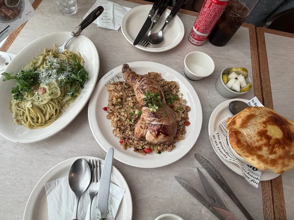 Table set with the ordered pasta and pilaf