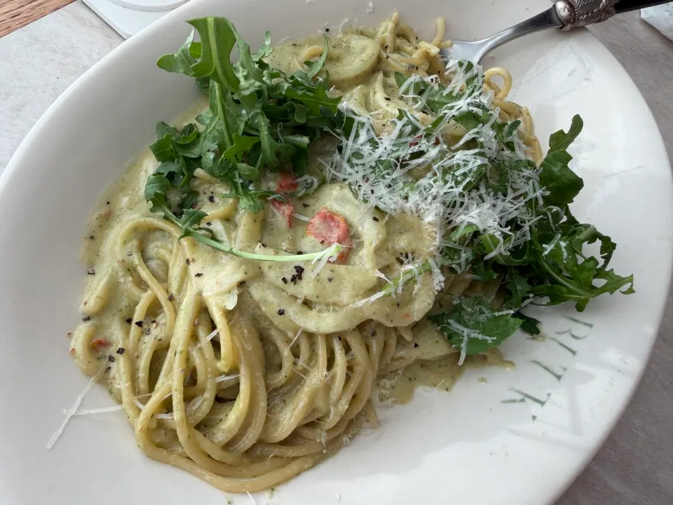 Plate of basil pesto cream pasta