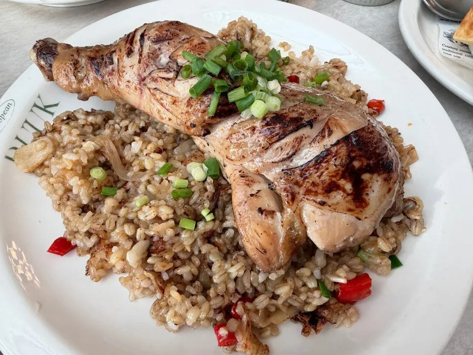 Chicken on top of kung pao sauce fried rice
