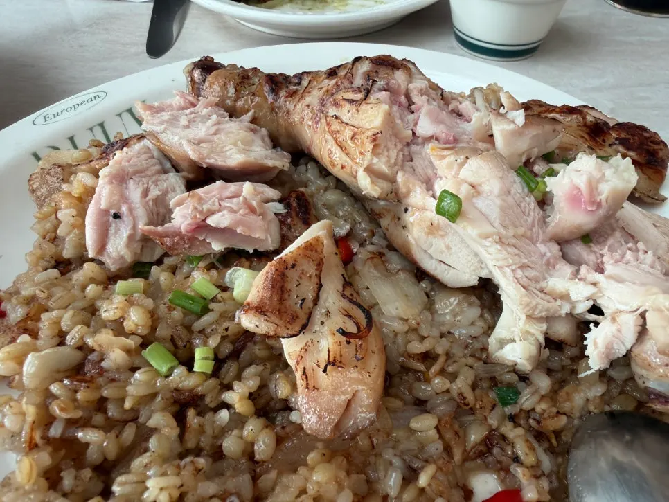 A plate of kung pao chicken pilaf
