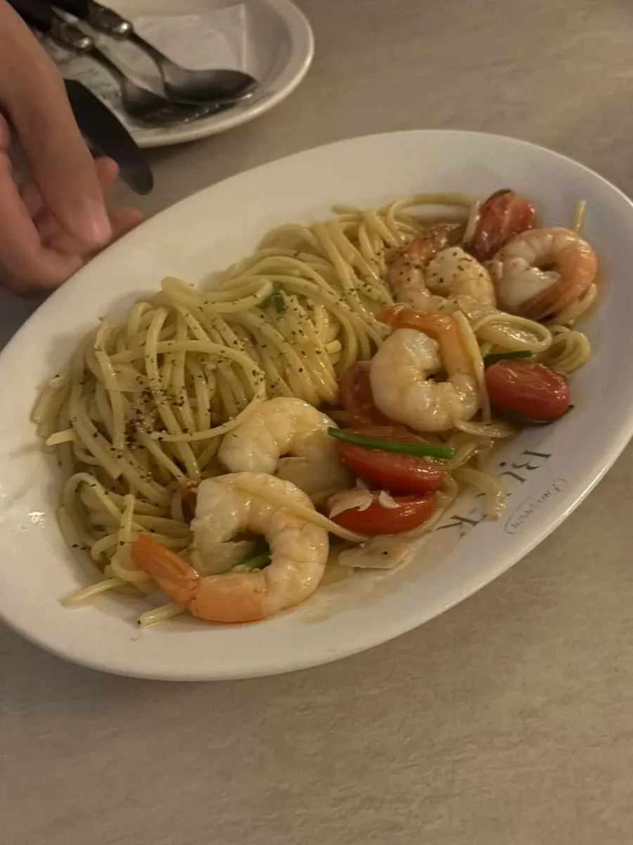 Shrimp anchovy oil pasta topped with shrimp