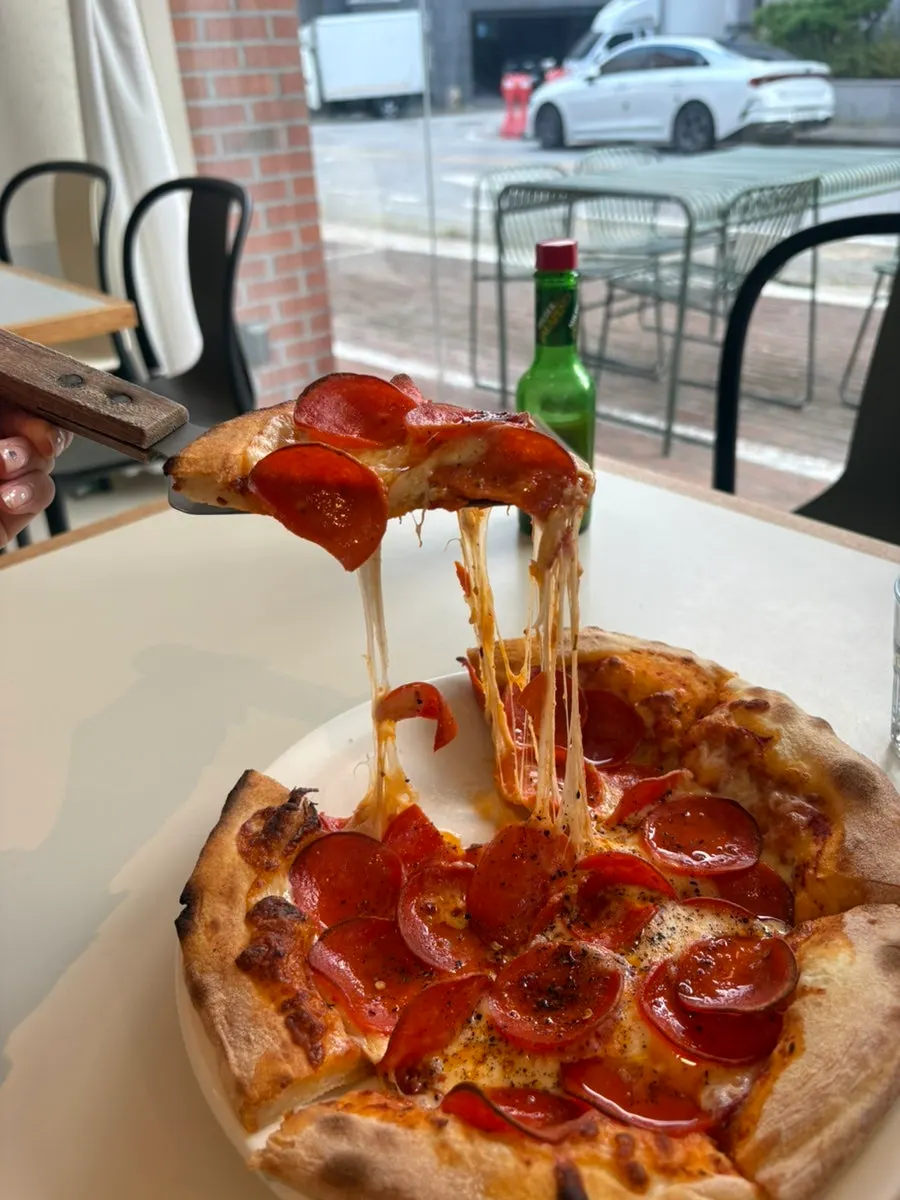 A freshly baked whole pepperoni pizza