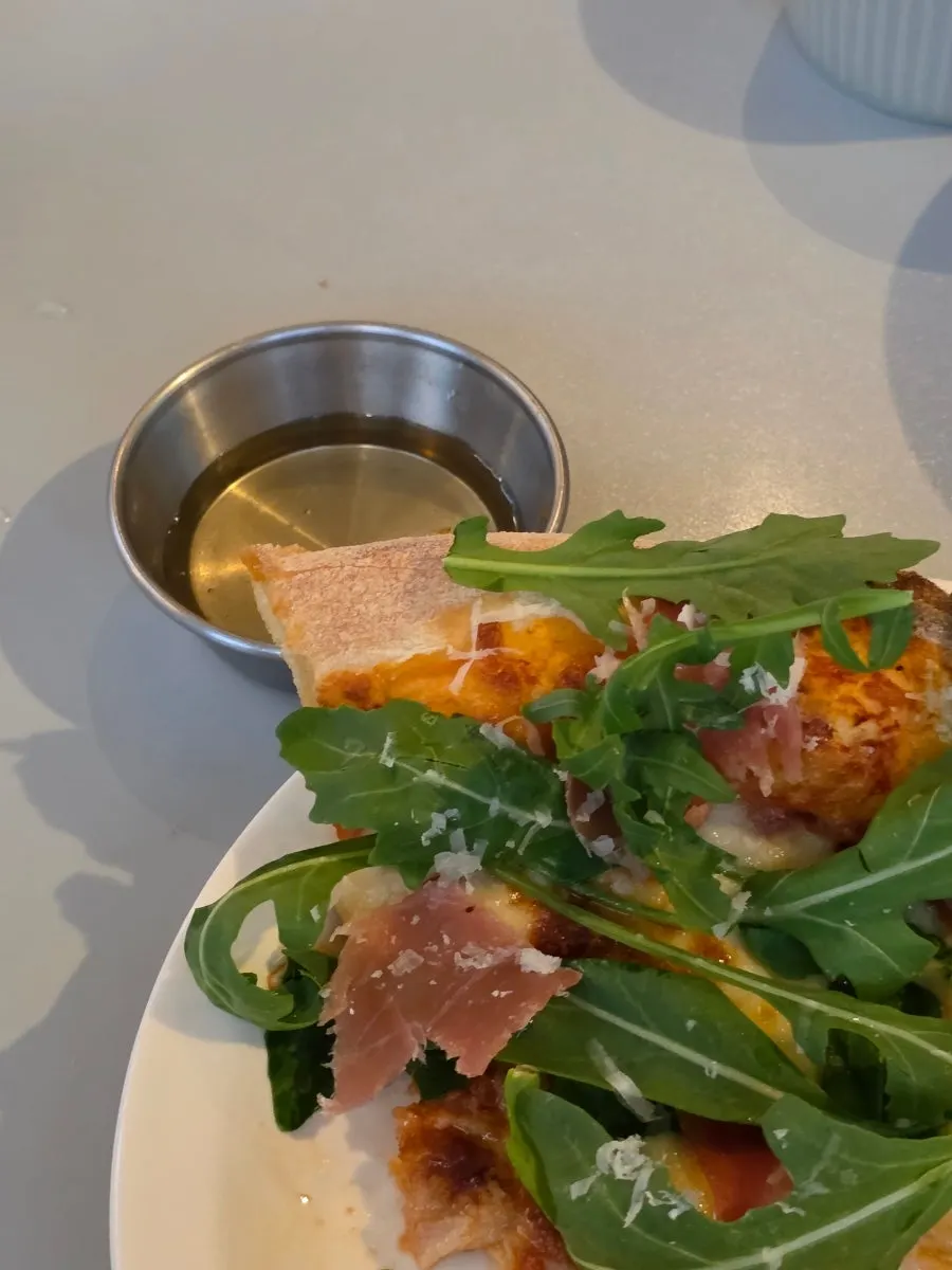 Honey we requested, served with the arugula pizza