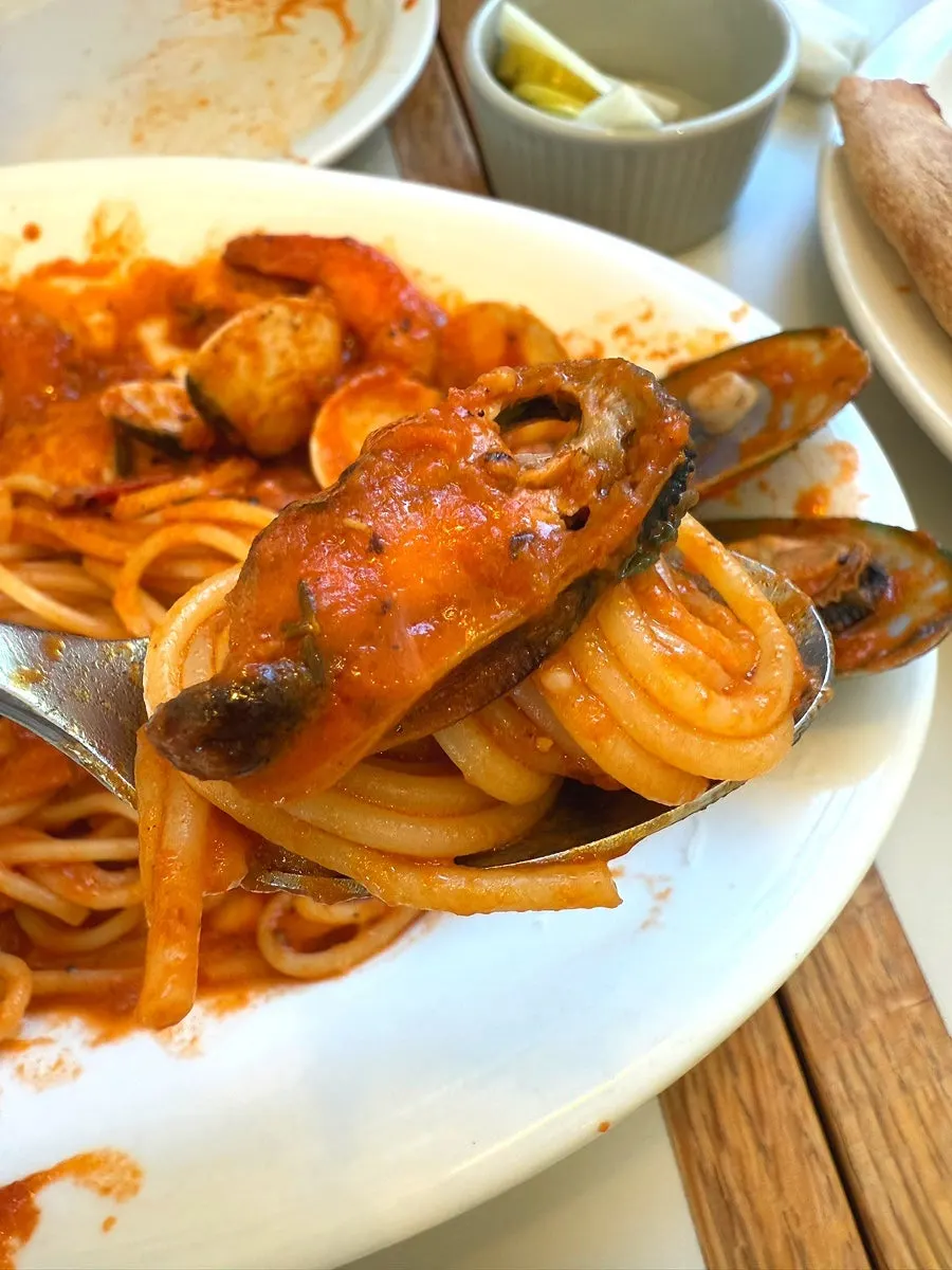 Close-up of the seafood tomato pasta with generous sauce