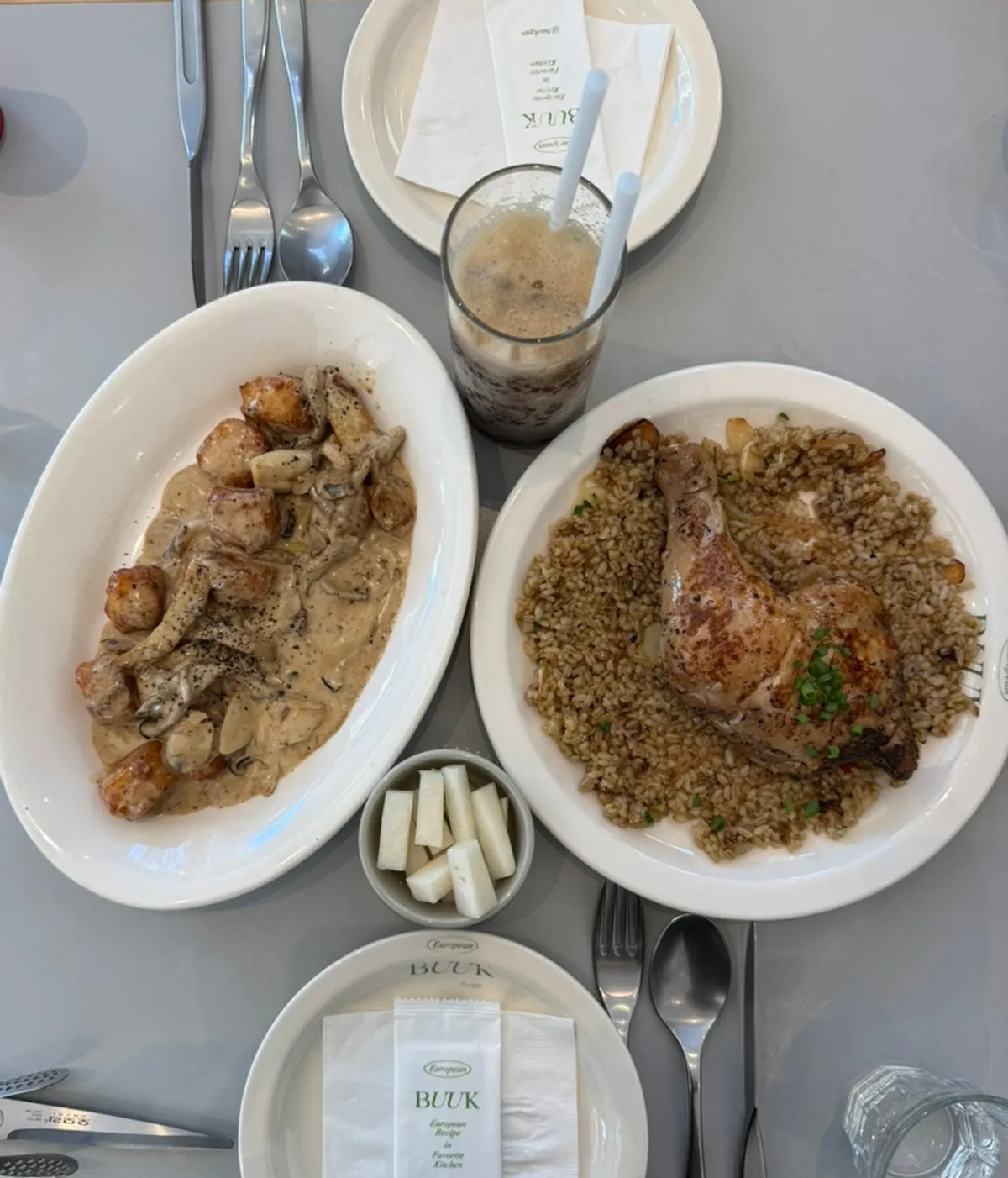 Full spread of Kung Pao chicken pilaf and truffle mushroom cream gnocchi