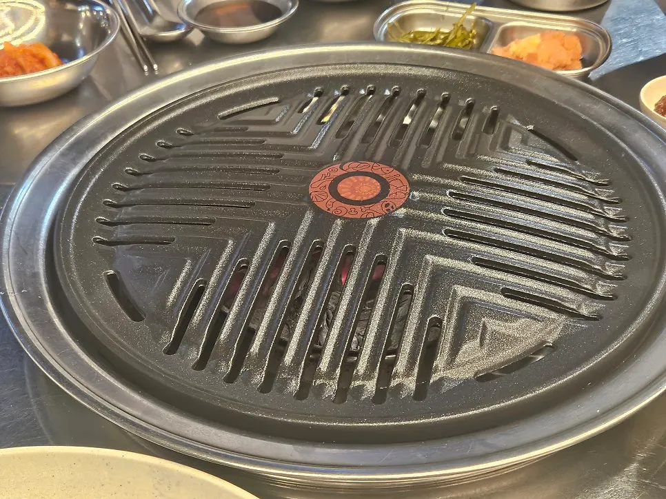 BBQ table with charcoal placed in the center