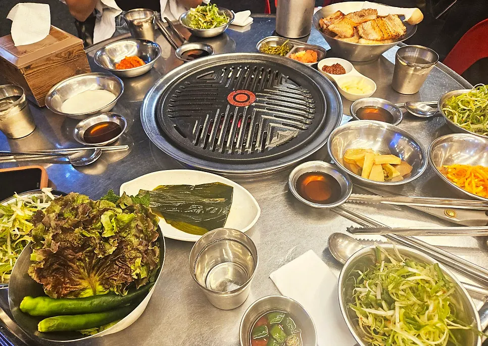 Side dishes being set on the table one after another