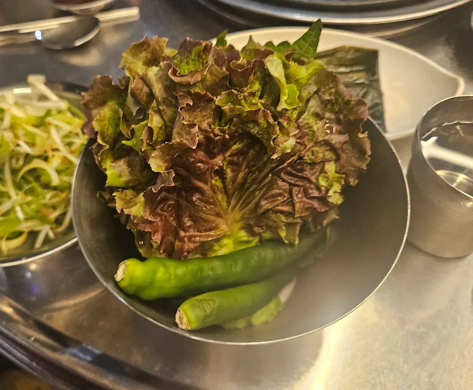 Table filled with a full spread of side dishes