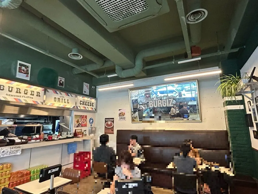 Interior seating at Buggies Tangbang with tables for 1 to 4 people