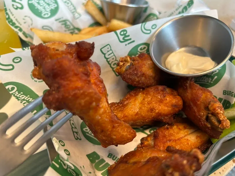Mango-flavored Jarritos enjoyed with the buffalo wings