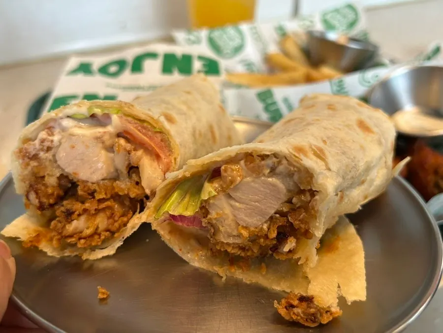 Cross-section of the chicken snack with crispy chicken inside