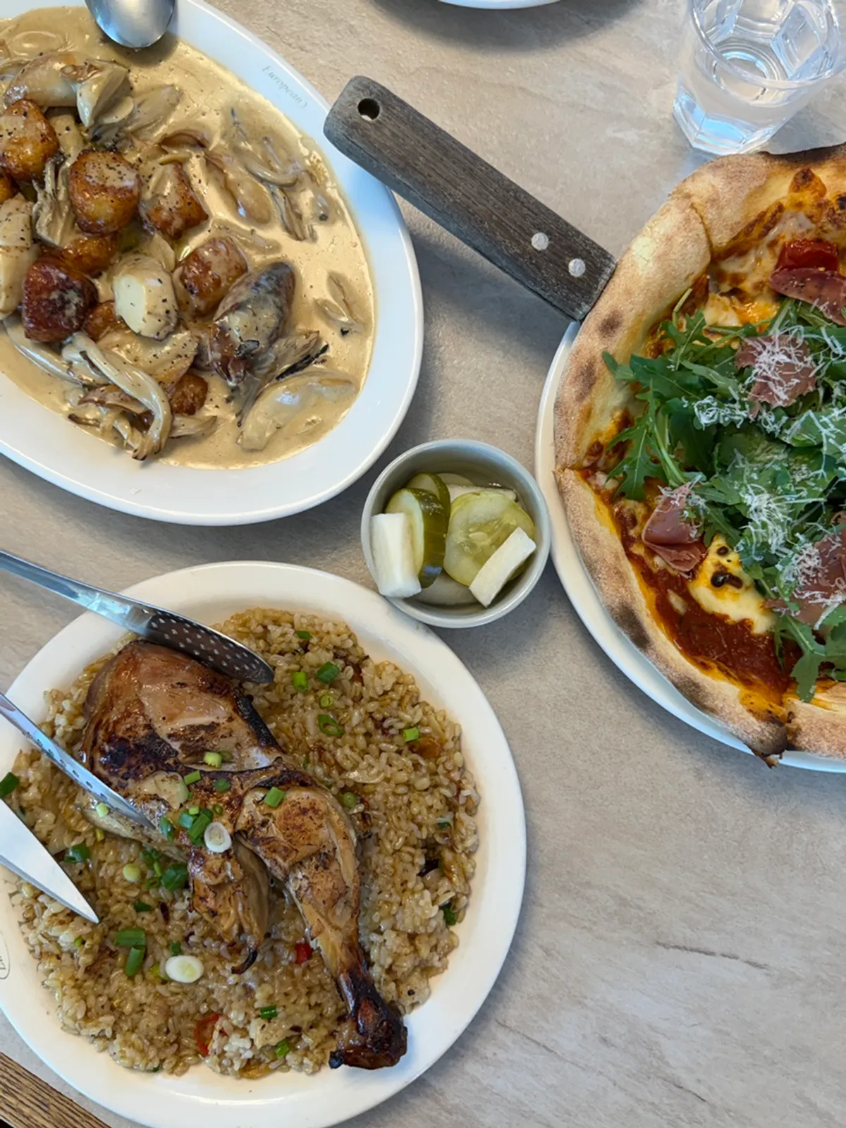 Three main dishes laid out on the table