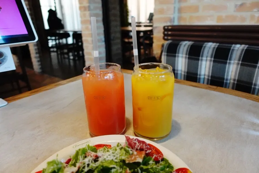 Table set with both pasta and pizza