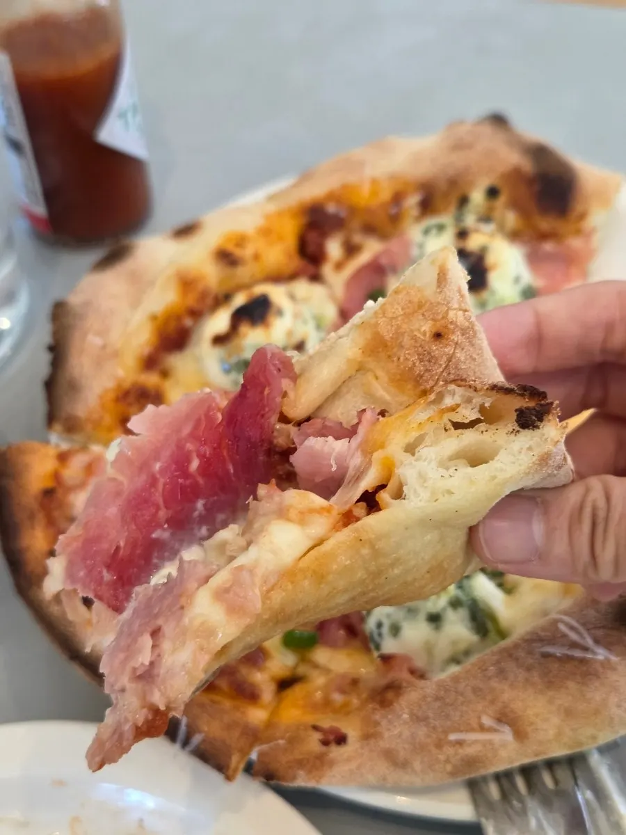 Cross-section of the chewy wood-fired crust