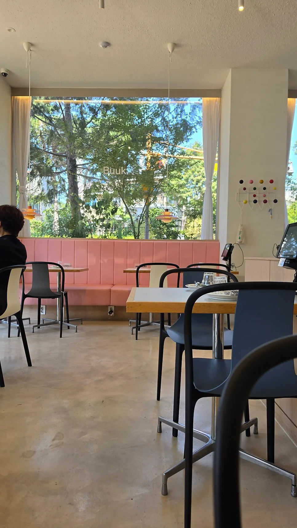 Sunlit seating by the picture windows