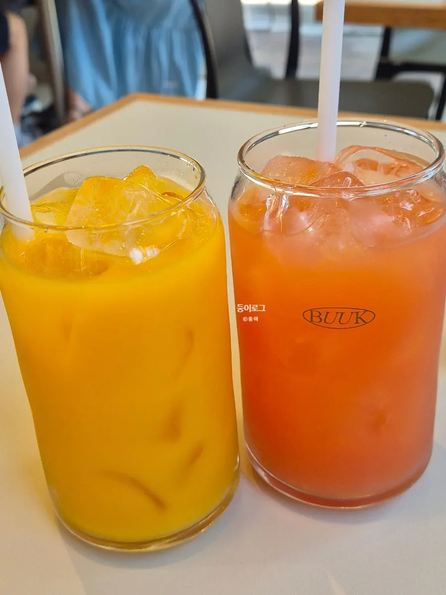 Two glasses of grapefruit and orange juice