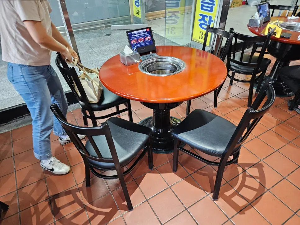 Interior with round tables and tablet menus
