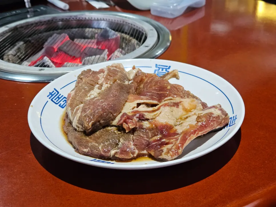 Thick hand-marinated pork galbi served on a plate
