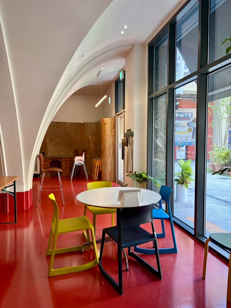 Restaurant interior with visible arched pillars