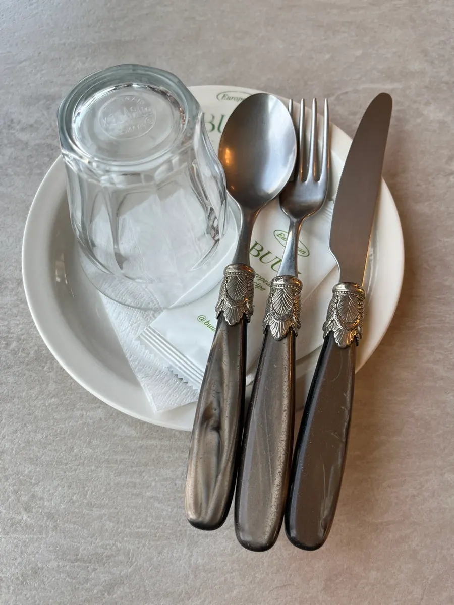 Table set with flatware at Bueokgan