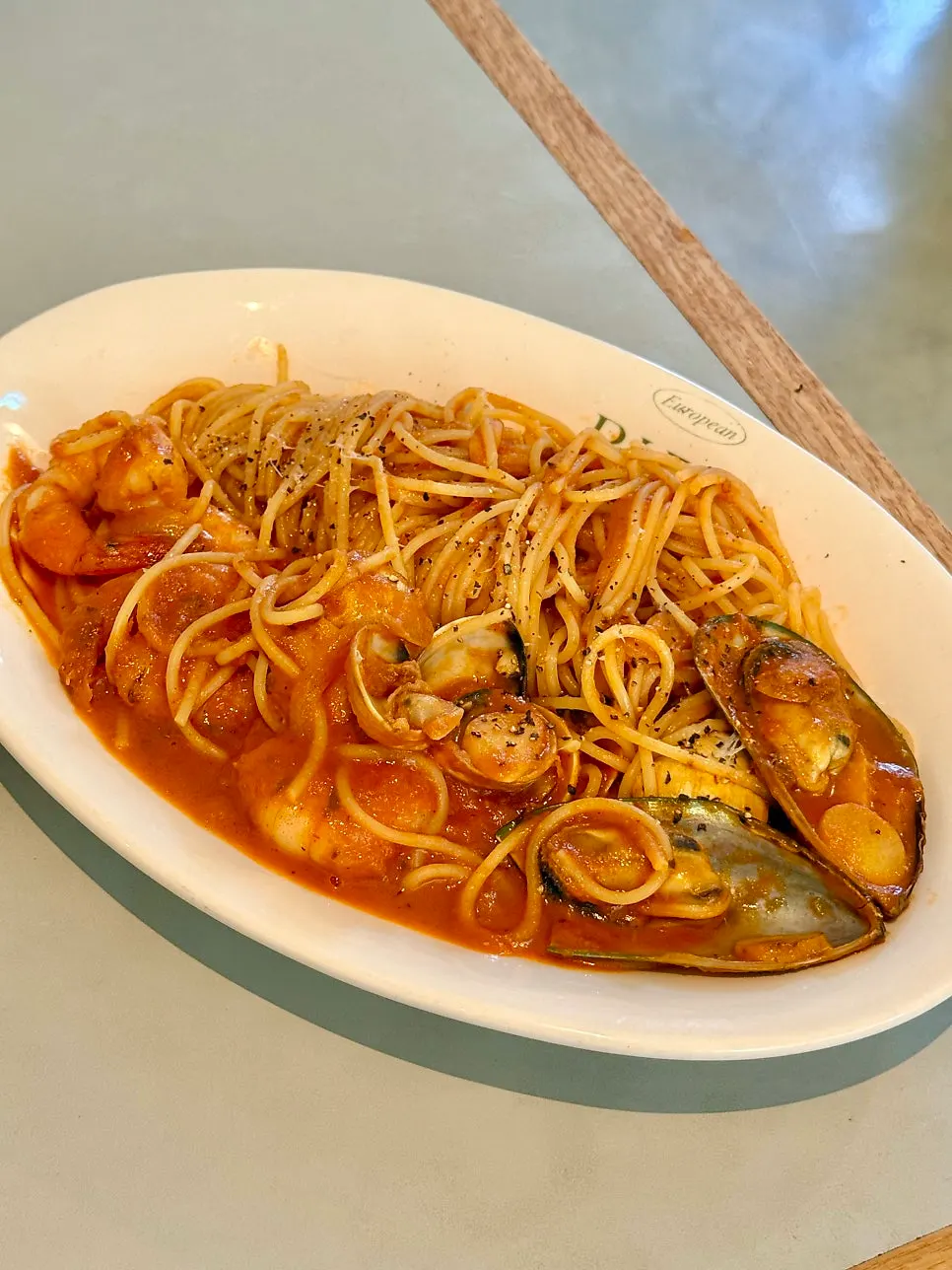The seafood tomato pasta served first