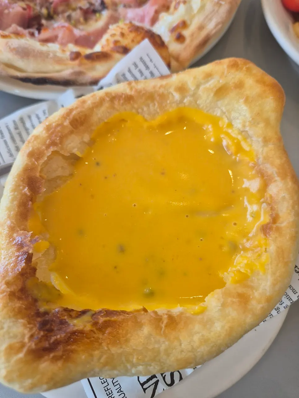 Pastry torn and dipped into the soup