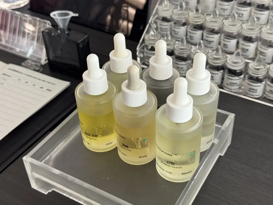 Checking the chosen fragrance oils on the table