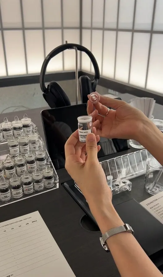 Smelling ingredient samples at Muhwawon