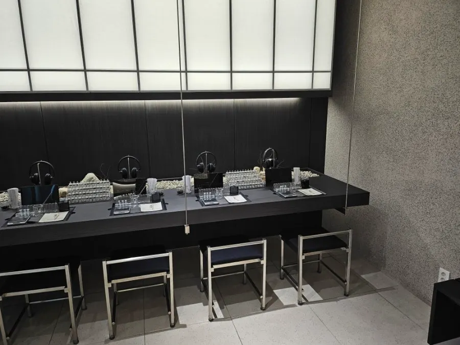 Perfume bottles and fragrance materials displayed at Muhwawon