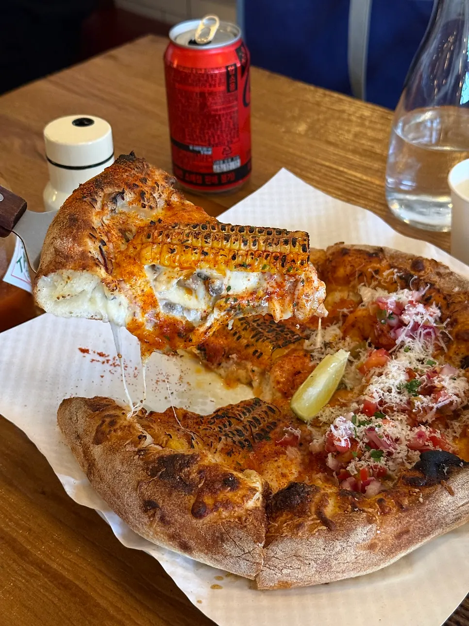 Half corn and taco pizza