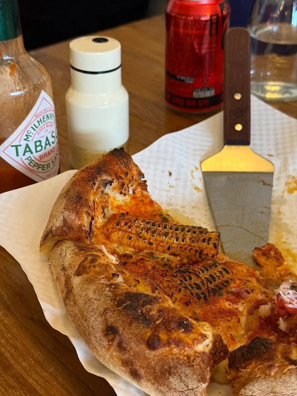 Half-and-half pizza with Coke