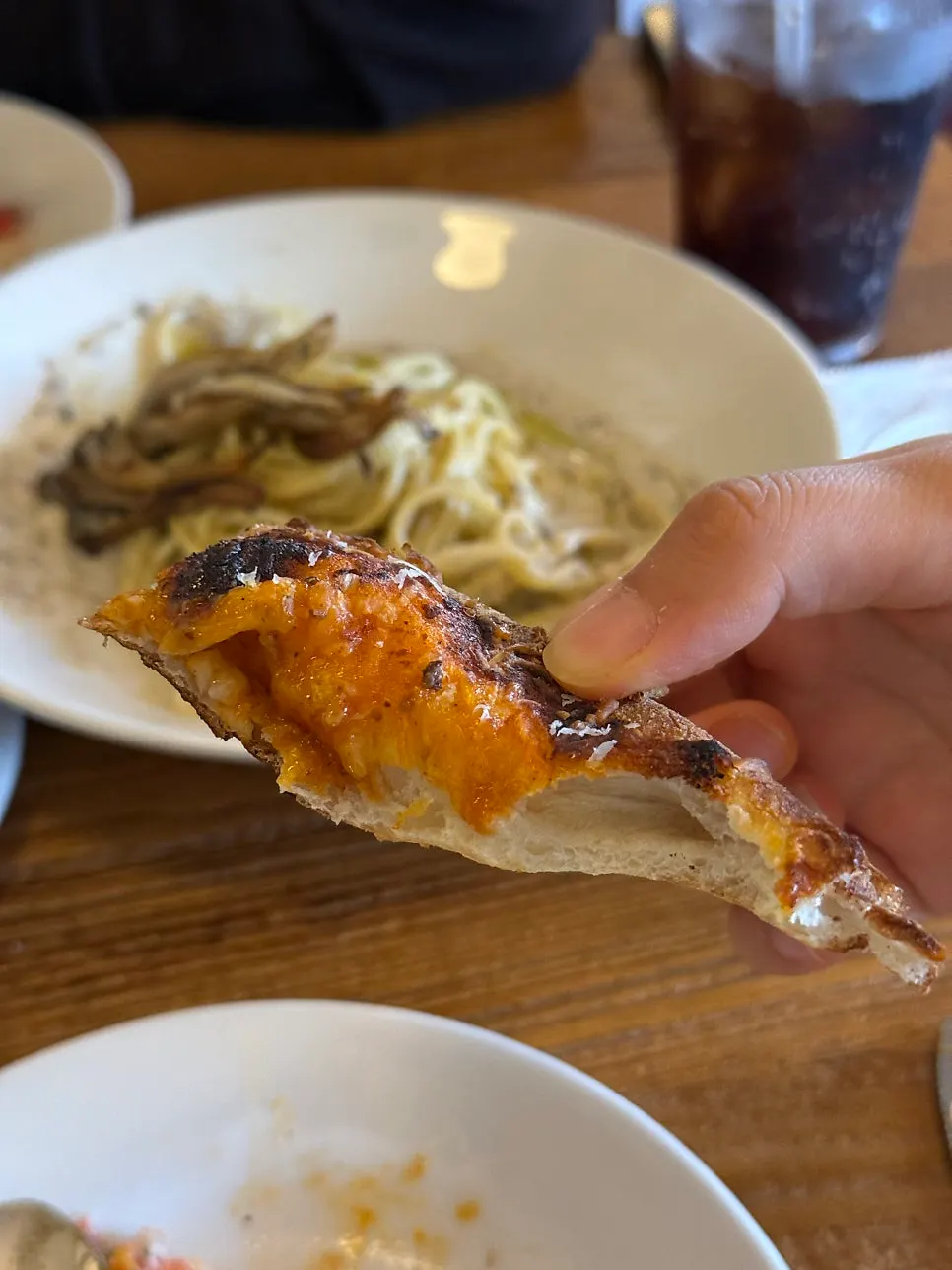 Pizza topped with shrimp, hot chicken, and salsa