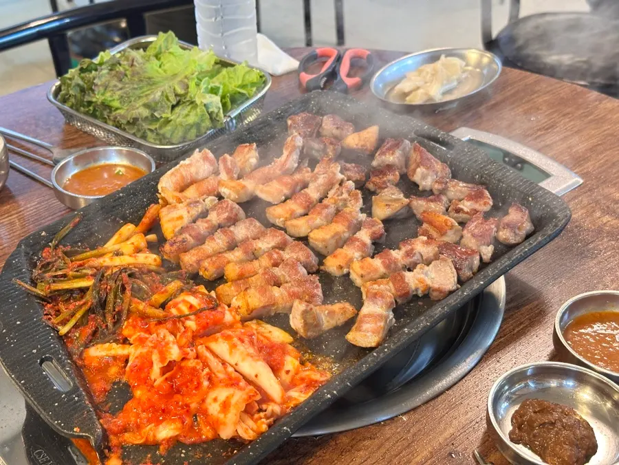 A combination of pork belly and pungent scallion kimchi