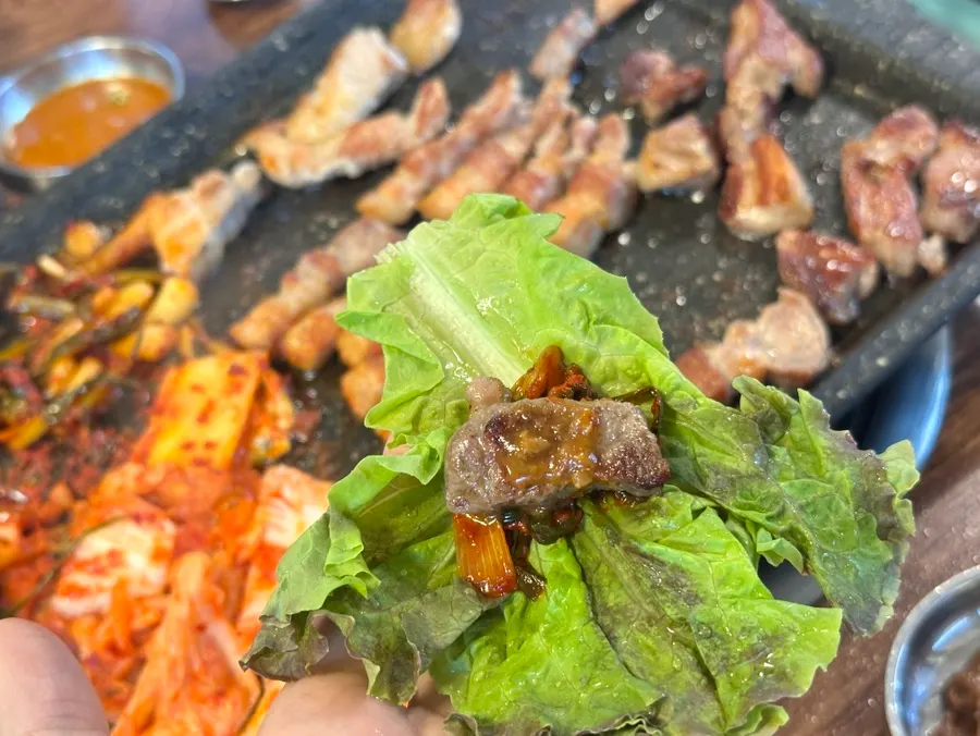 A special combination of pork belly, jjagechi, and scallion kimchi